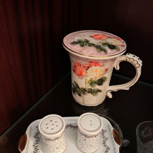 Porcelain vintage decorations used, set with lidded cup and salt and pepper