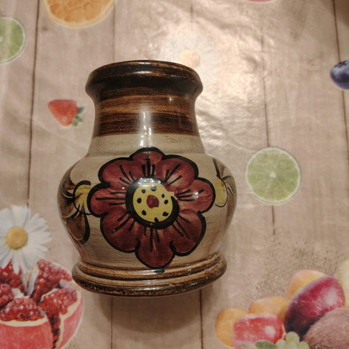 Antique vase with decoration restored
