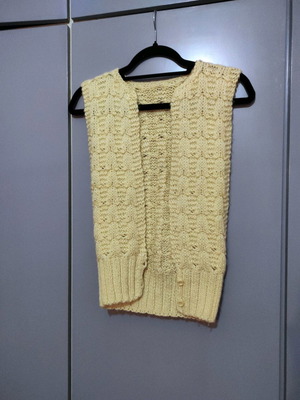 Sleeveless knitted vest used with pattern yellow pale
