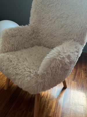 Armchair with faux fur upholstery