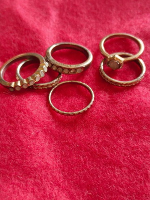 Metal rings used, set with light blue stones