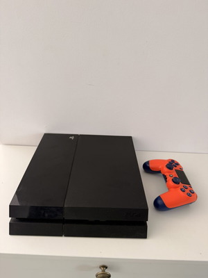 PlayStation 4 Fat 1TB console with controller