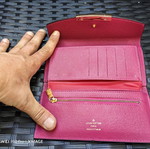 Louis Vuitton wallet used, authentic with visible marks inside