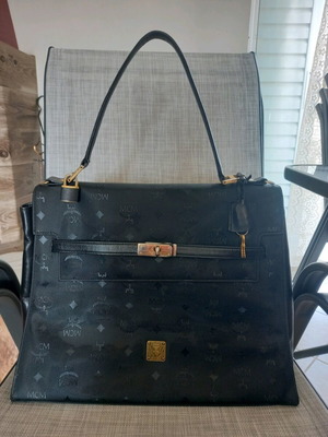 MCM Kelly handbag used, black with leather details