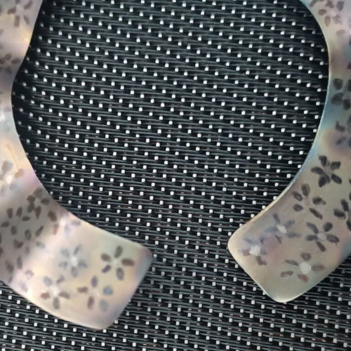 Titanium bracelet with iridescence and flowers like new