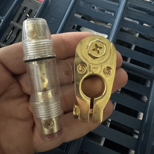 Fuse holder and negative pole clamp