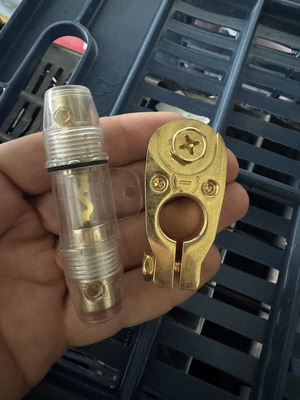Fuse holder and negative pole clamp