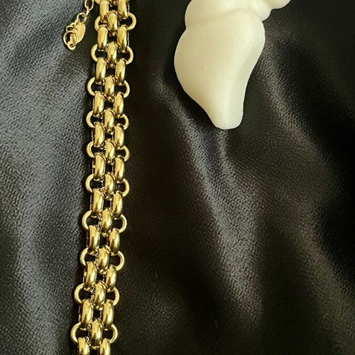 Bracelet made of gold-plated steel, new