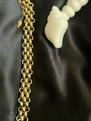 Bracelet made of gold-plated steel, new