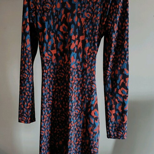 Midi dress like new with draped detail and animal print