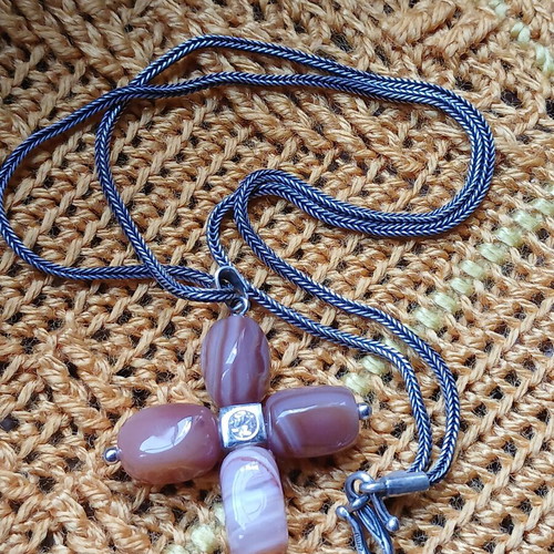 Silver necklace cross with carnelian stones used