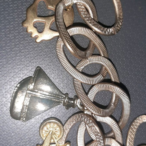 Bracelet new with boat, skull, and bicycle charms