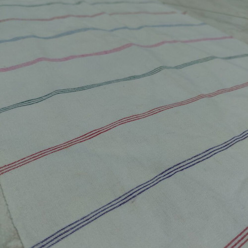 Traditional cotton fabric on loom new, white with colorful stripes