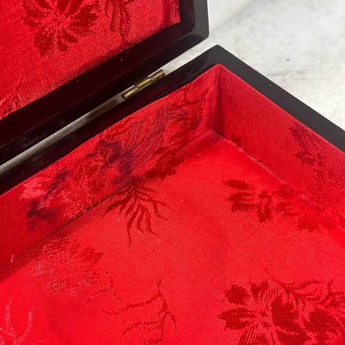 Vintage wooden jewelry box used with red satin lining