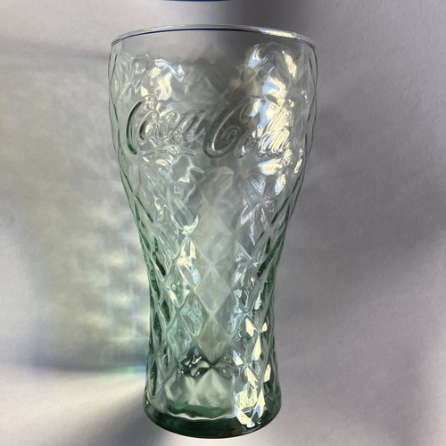 Coca-Cola collectible glass, vintage embossed design