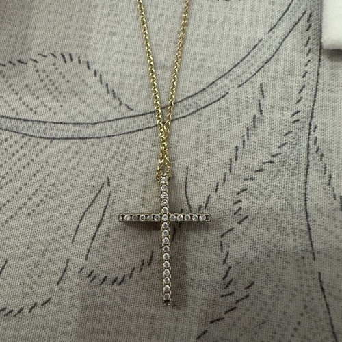 14k gold cross pendant with 9k long chain, reversible design