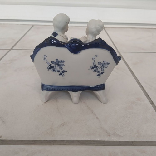 Vintage couple figurine reading on sofa rococo style like new
