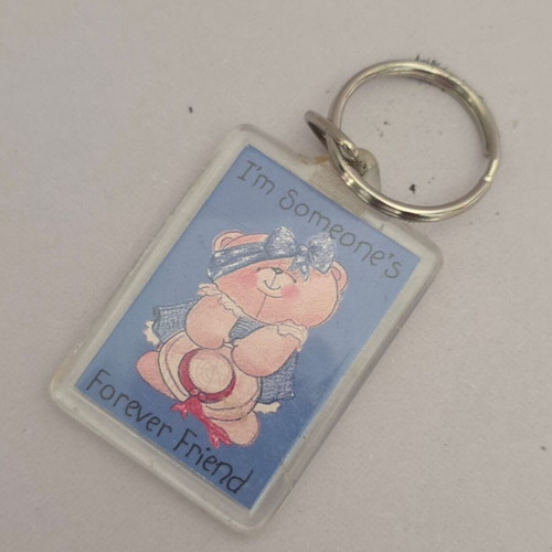 Forever Friends keychain with pink teddy bear and blue outfit