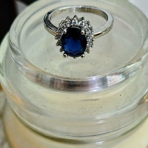 Women's ring with blue stone like new, size 8