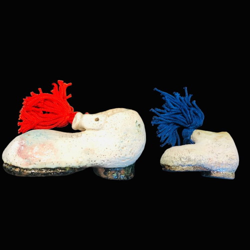 Decorative shoes used, handmade ceramic with tassels