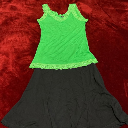 Women's set of 2 pieces used, black BSB skirt and green Voyelles lace top