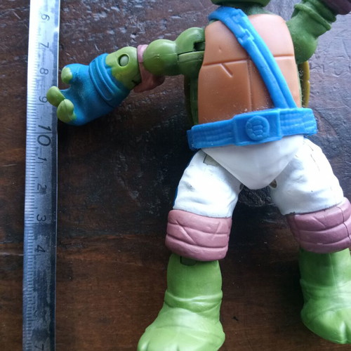 Leonardo Teenage Mutant Ninja Turtle action figure with movable arms