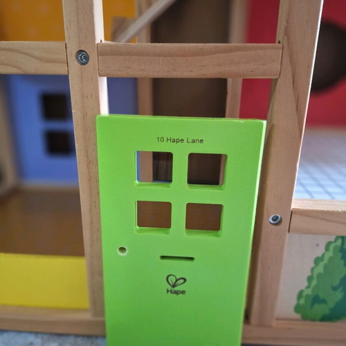 Hape wooden dollhouse like new