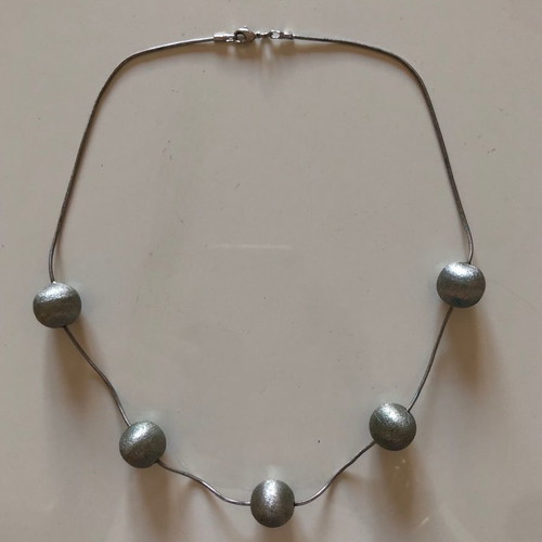 Snake chain necklace used with 5 hammered metal balls
