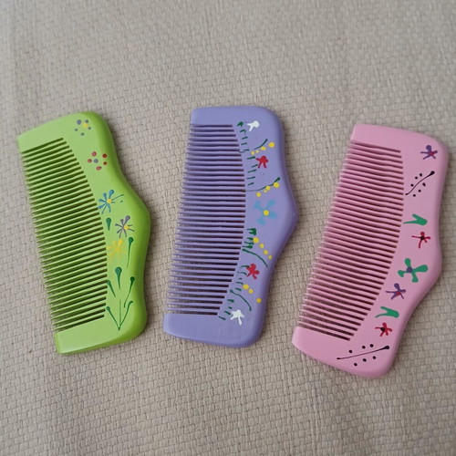 Wooden combs with handmade painted designs