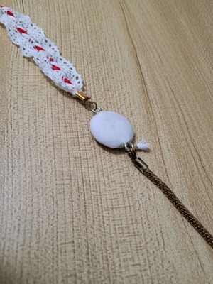 Martis bracelet like new, handmade with red and white thread