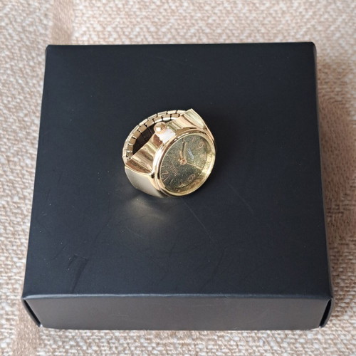 Ring watch quartz with khaki dial and gold bracelet like new