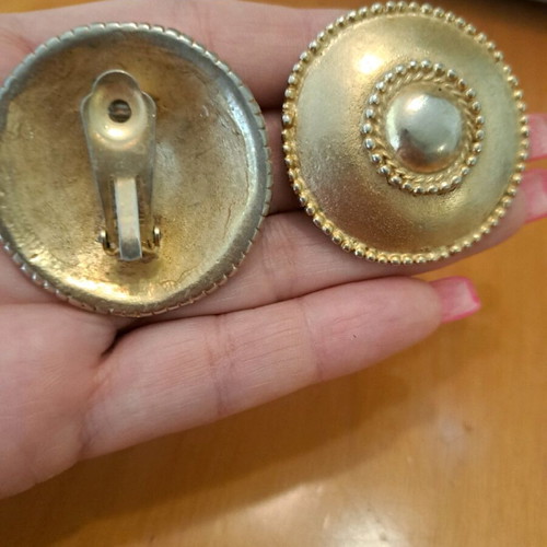 Vintage earrings used, large gold-colored