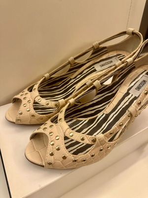 Moschino peep toe beige heels.