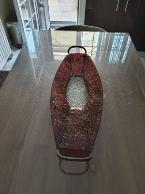 Decorative elongated glass platter like new with red and gold crackle on metal base