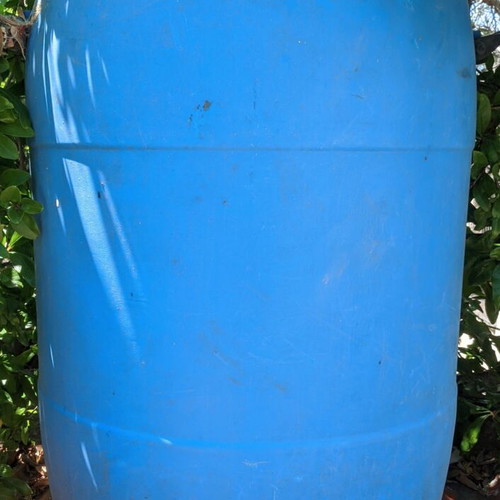Plastic barrel like new with lid and handles