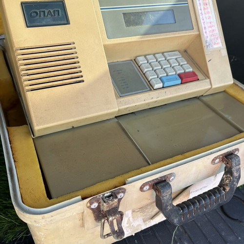 OPAP machine for tickets used, with case
