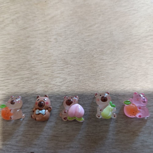 Capybara figures set of 5 like new, glow in the dark