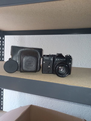 Zenit TTL camera used with Helios-44M-4 lens and leather case