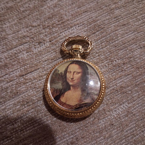 Double-sided pendant watch with Mona Lisa design