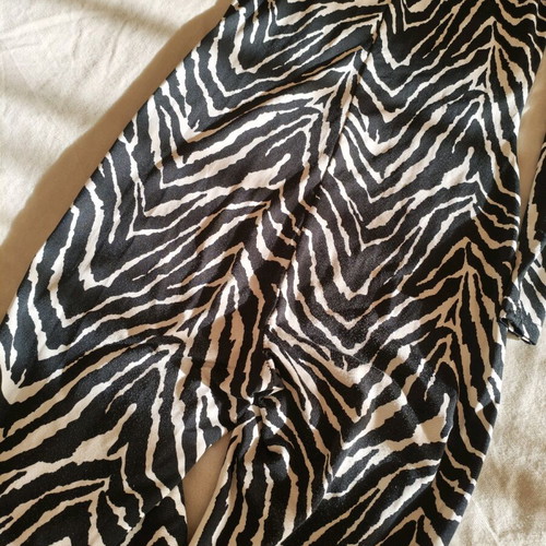 Zebre one-piece suit size S like new