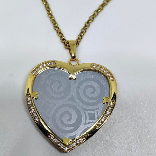 Heart Pendant Necklace with Embossed Spiral Designs, like new