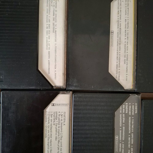 Cassette tapes used with Greek and foreign music, many