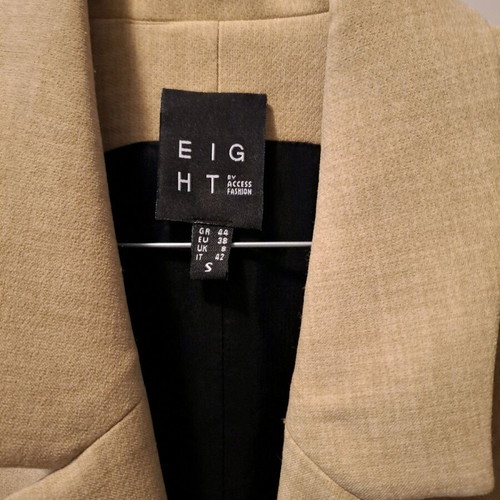 Eight suit like new, worn once