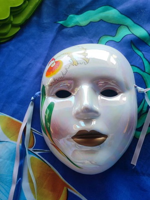 Handmade decorative ceramic mask like new with iridescent paint
