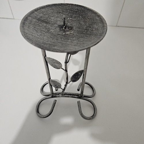 Metal candlestick with leaves like new