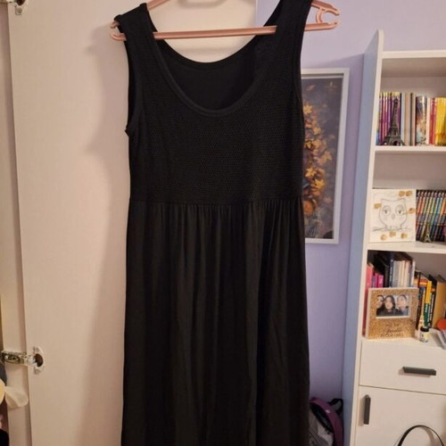 Black sleeveless dress with honeycomb style top