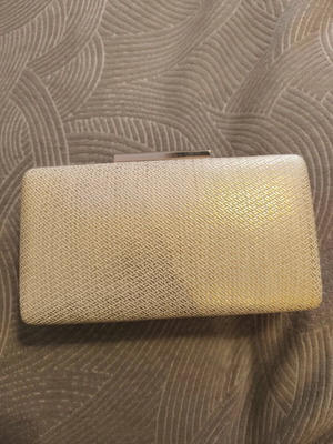 Clutch with chain in yellow gold color like new