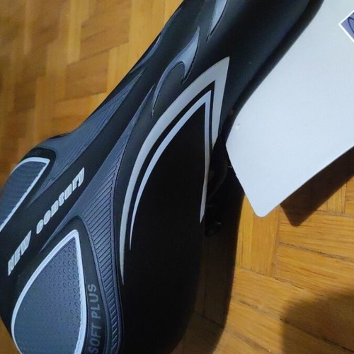 Bicycle saddle new, soft with rear reflector and adjustable front