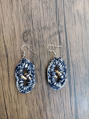 Handmade crocheted earrings with unique designs