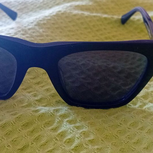 Hawkers women's sunglasses used, black with lens wear